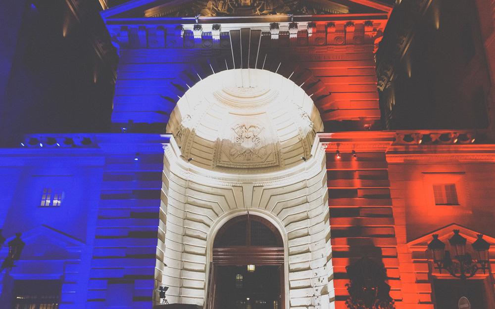 Illuminated Paris building as French Flag